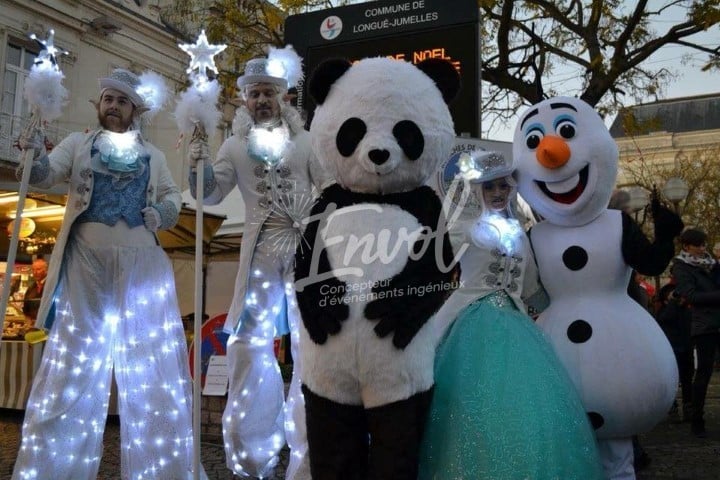 Échassiers blancs lumineux Envol Noël
